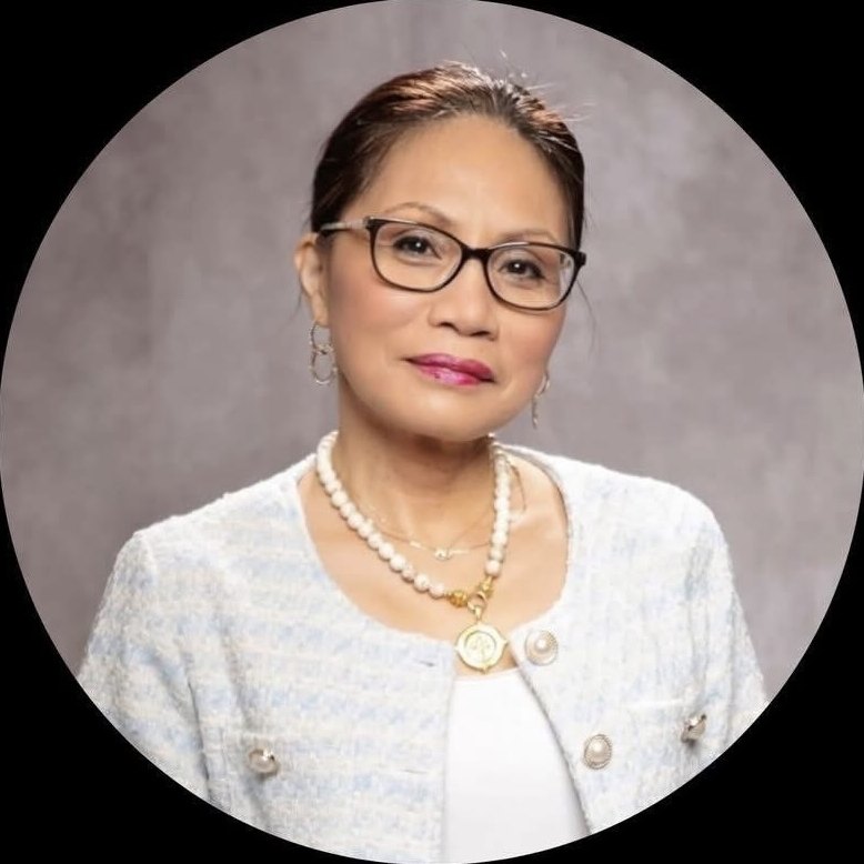Florissa Maher, nurse, founder and CEO of Loyal Care LLC, in a light blue jacket and pearl necklace