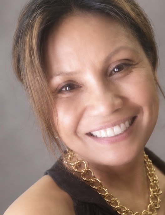 Florissa Maher, founder of Loyal Care LLC, smiling