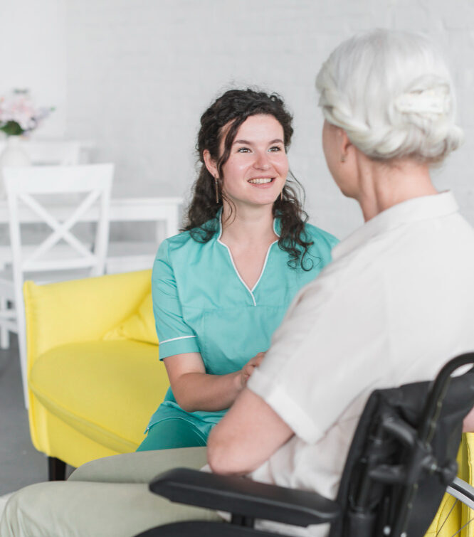 Caregiver assisting a senior woman with personalized healthcare coordination services in Fulton County, GA