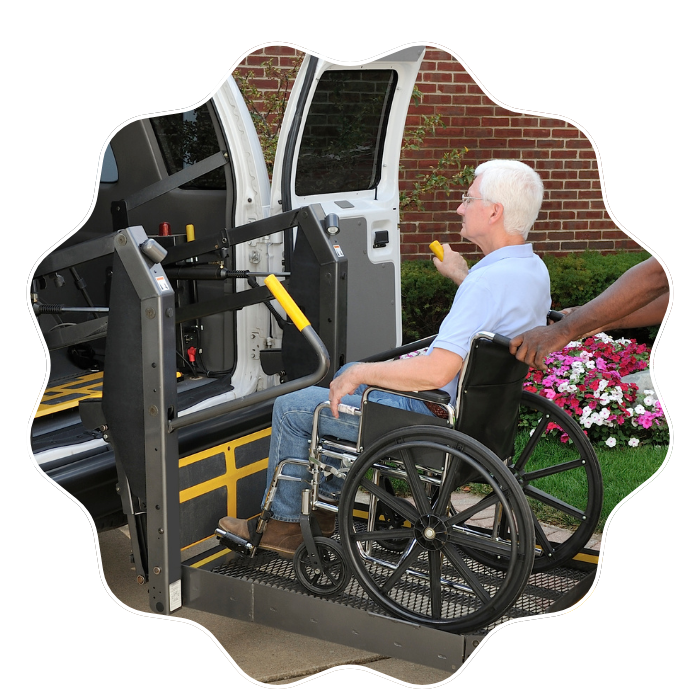 Senior woman using wheelchair-accessible transportation service with caregiver assistance in Fulton County, GA