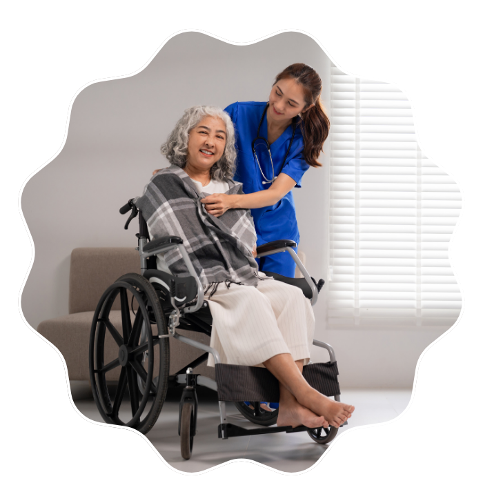 Caregiver assisting a senior woman in a wheelchair with compassionate companion care services in Fulton County, GA