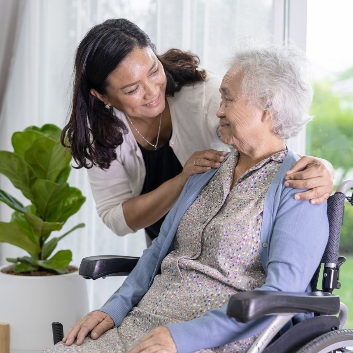 Caregiver comforting a senior woman while providing reliable 24-hour home care support in Fulton County, GA